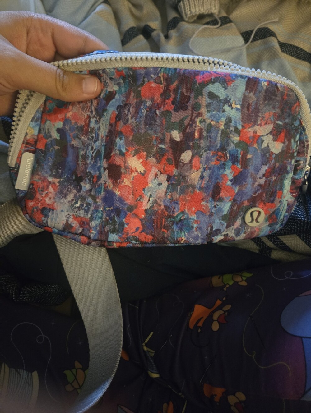 Lululemon Everywhere Belt Bag 1L in the "Flower Glide Multi / Vapor"